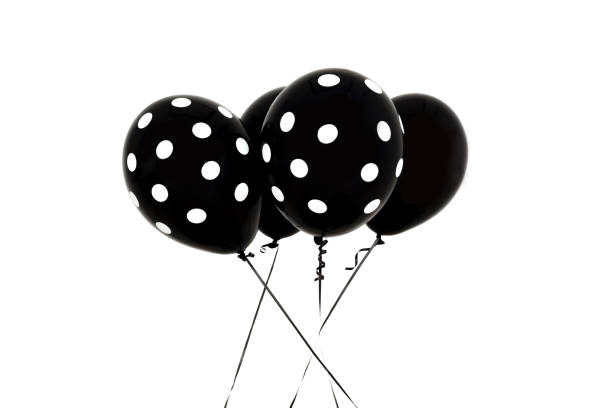 istock Group of black balloons isolated on white background 1020475084