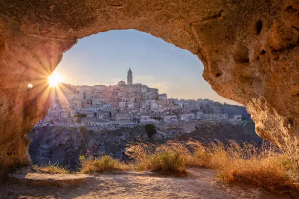 Cityscape image of medieval city of Matera, Italy during beautiful summer sunset.
