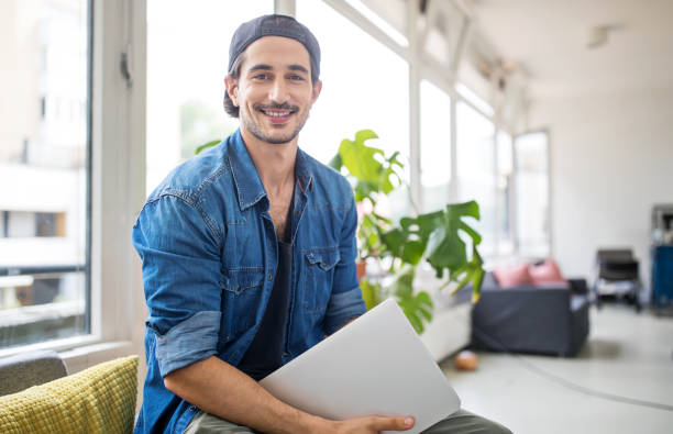 istock Handsome young businessman smiling in office 1020483932