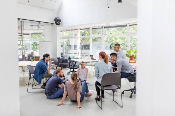istock Team of creative people having a meeting at startup office 1020489418