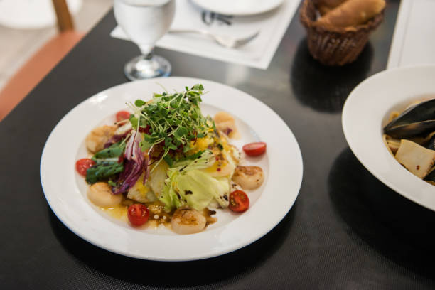 istock Italian restaurant Scallops Salad, grilled scallops shell with vegetable 1020498386