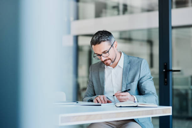 istock Working hard to keep taking the lead in the business game 1020498688