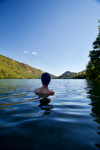 Female solo traveler in France rural areas. River l'Ain, Lac de Nantua lake, View of Alps and Chamonix - Mont blanc.