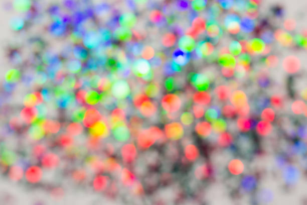 istock Colorful beautiful blurred bokeh background Holiday texture. Glitter multicolored light spots 1020516384
