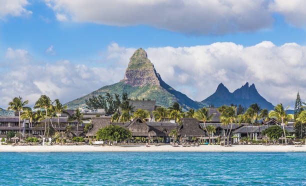 istock Flic en flac beach with Piton de la Petite Riviere Noire Mauritius 1020522918