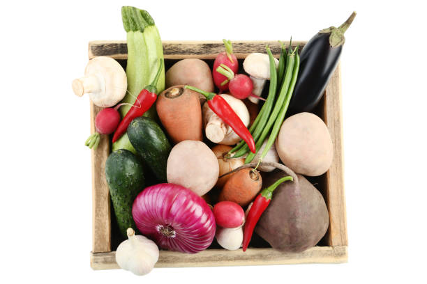 istock Fresh vegetables in crate on white background 1020538312