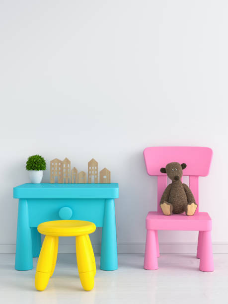 istock table and chair in white child room, 3D rendering 1020538392