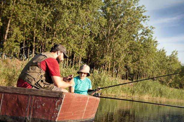 istock father and son fishing together 1020538996