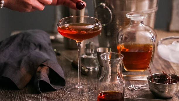 istock Manhattan cocktail garnished with brandied cherry. 1020542108