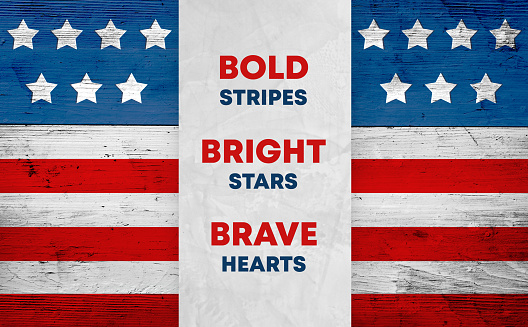 American flag on wood background and patriotic slogan Bold stripes, Bright stars, Brave hearts