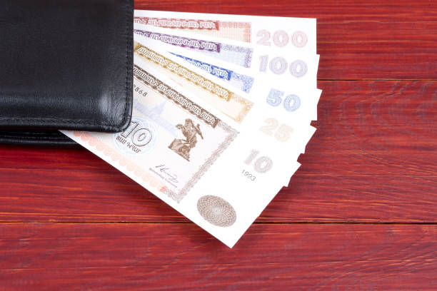 istock Old money from Algieria in the black wallet 1020543460