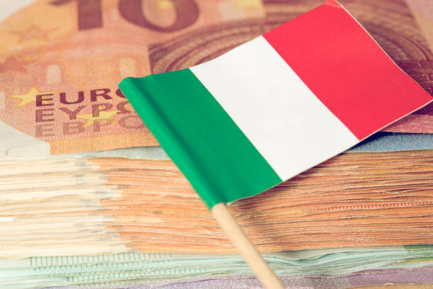 flag of italy and euro banknotes - eurozone debt crisis imagens e fotografias de stock