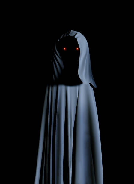 istock Spooky monster in hooded cloak with glowing eyes 1020545004
