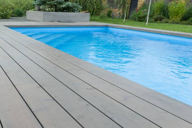istock Special wooden board around the swimming pool, texture, background. 1020545166