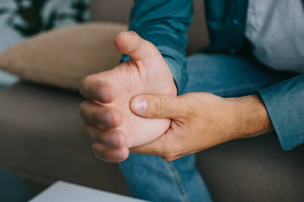 istock close-up partial view of man having wrist pain 1020548294
