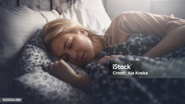 Weekend Home Activities Stock Photo - Download Image Now - Sleeping, One Woman Only, Bed - Furniture