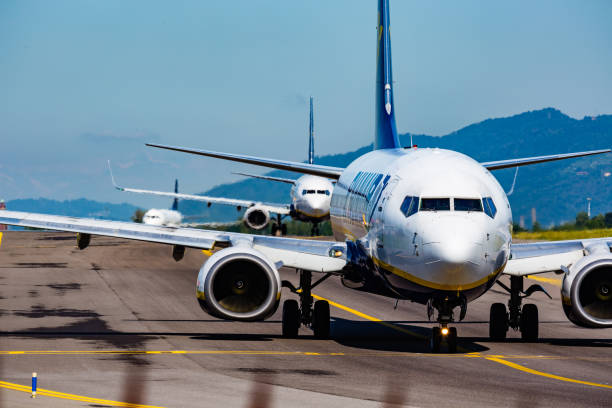 Ryanair airplane Bergamo, Italy -23 July 2018:Here we can see three aircraft Ryanair 737 who are about to take off in Bergamo, Orio al Serio airport near Milan-Italy boeing 737 photos stock pictures, royalty-free photos & images
