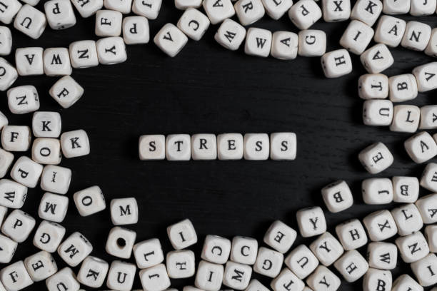 istock Word on wooden cubes on a black wooden table with copy space 1020566058