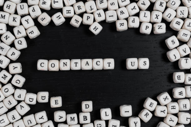 istock Word  on wooden cubes on a black wooden table with copy space 1020567464