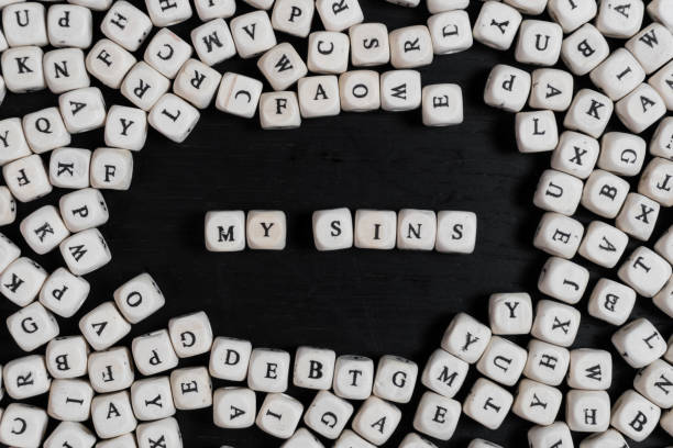 istock Word  on wooden cubes on a black wooden table with copy space 1020568340