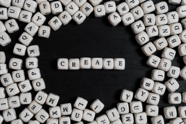 istock Word  on wooden cubes on a black wooden table with copy space 1020570442