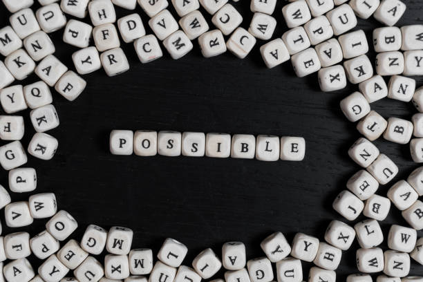 istock Word  on wooden cubes on a black wooden table with copy space 1020572614