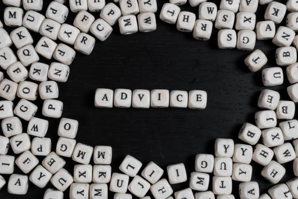 istock Word  on wooden cubes on a black wooden table with copy space 1020572700