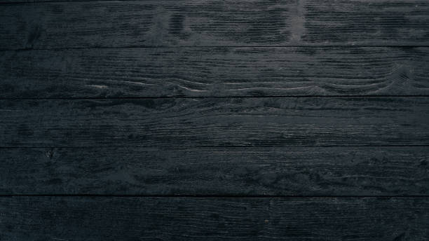 istock Old vintage wooden black background. Top view. Free space for your text. 1020573140