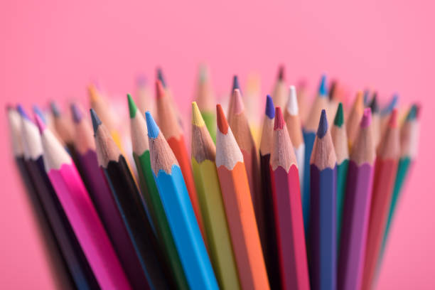 istock Close-Up Of Multi Colored Pencils Against Pink Background 1020573996
