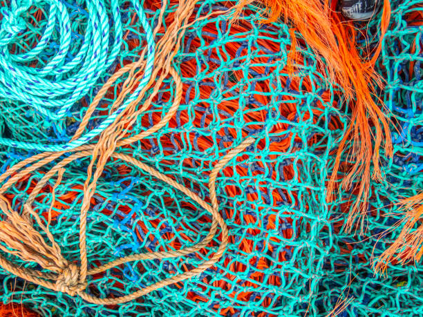 istock blue and orange fishing nets 1020587218