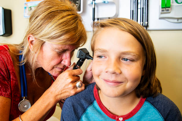 istock A female doctor checking a child's ear using an otoscope 1020611516