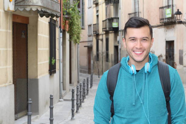 istock Handsome mixed race person heading to school 1020635406