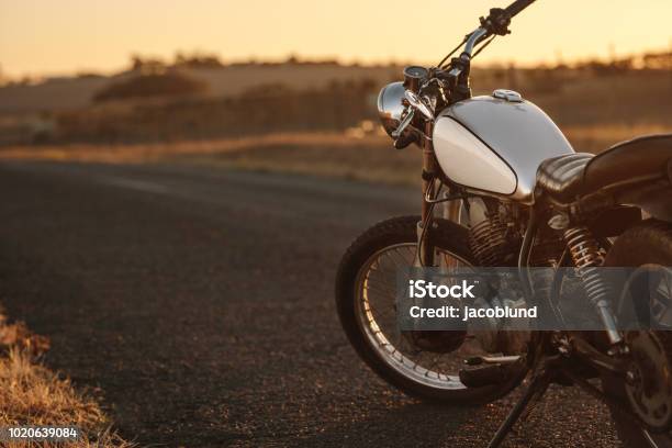 Vintage Motorcycle On Country Road Stock Photo - Download Image Now - Motorcycle, Retro Style, Old-fashioned