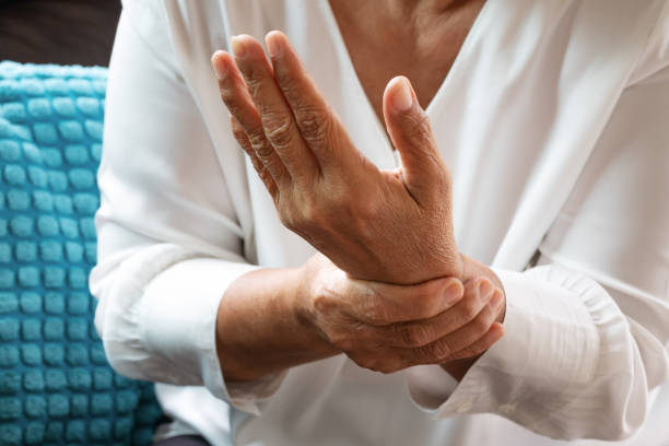 istock old woman suffering from wrist hand pain, health problem concept 1020649030