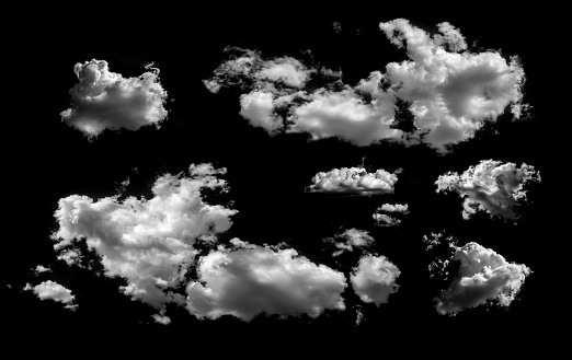 collection of white clouds isolated on black background