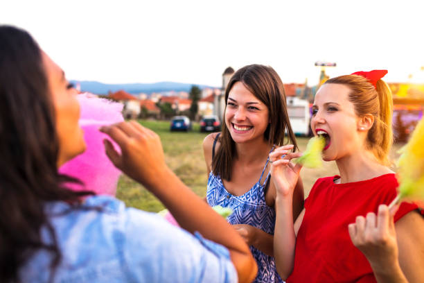 istock Fun with cotton candy at a fun fair 1020670636