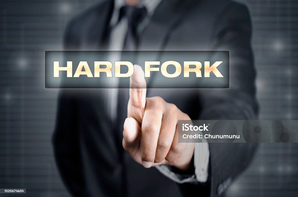 Finger pointing on hard fork Finger pointing on hard fork in consensus Blockchain Stock Photo