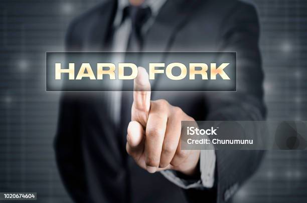 Finger Pointing On Hard Fork Stock Photo - Download Image Now - Blockchain, Altcoin, Cryptocurrency