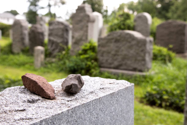 istock Mourning rocks on a headstone in Jewish cemetery 1020685872