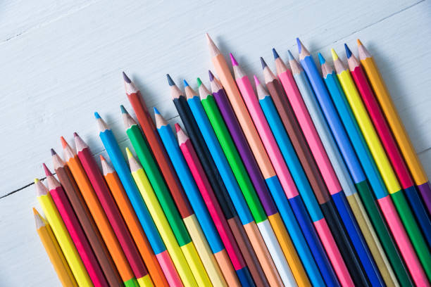 istock High Angle View Colorful Colored Pencils On Wooden Table 1020686908