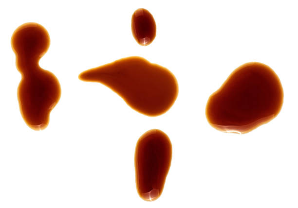 istock Spilled soy sauce isolated on white background 1020693118