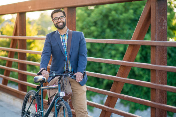 istock Happy Business Man Biking to Work 1020693394