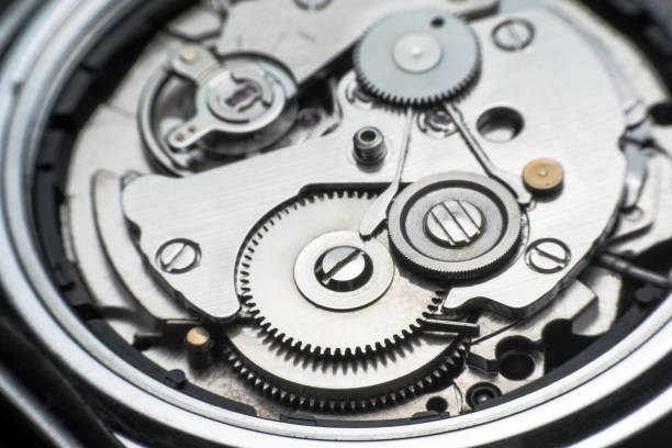 istock Mechanical watch / Gear Clock. Close up cogs and gears inside clock background 1020706318