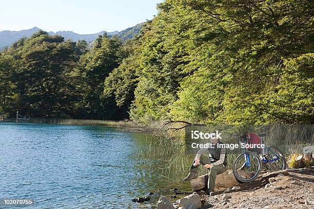 Man With Mountain Bike By Lake Stock Photo - Download Image Now - 35-39 Years, Adult, Adults Only
