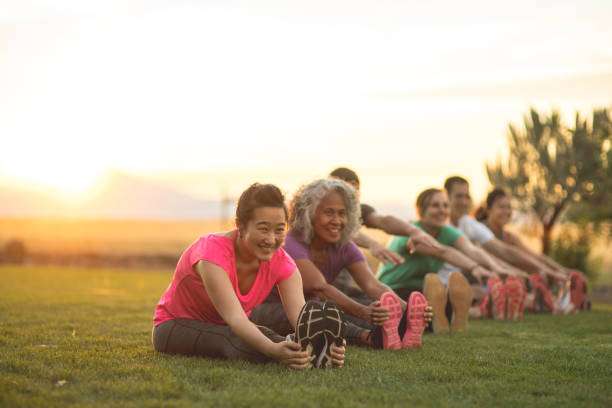 istock Coed yoga outside in the morning! 1020728856
