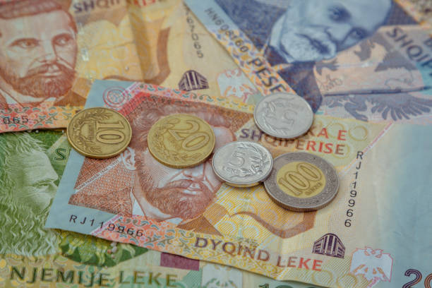 istock Albanian coins and banknotes on the beach. 1020736414