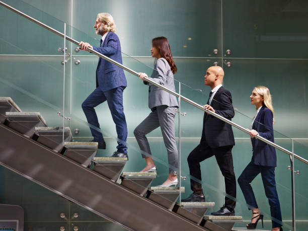 istock multiethnic business people walking on stairs 1020739594
