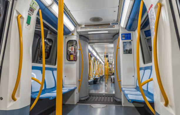 Madrid Metro Madrid, Spain - August 8, 2018: Quiet times inside of a Madrid subway train. The Madrid Metro is a subway system serving the city of Madrid, capital of Spain. The system is the 7th longest subway in the world. contemporary madrid european culture travel destinations stock pictures, royalty-free photos & images