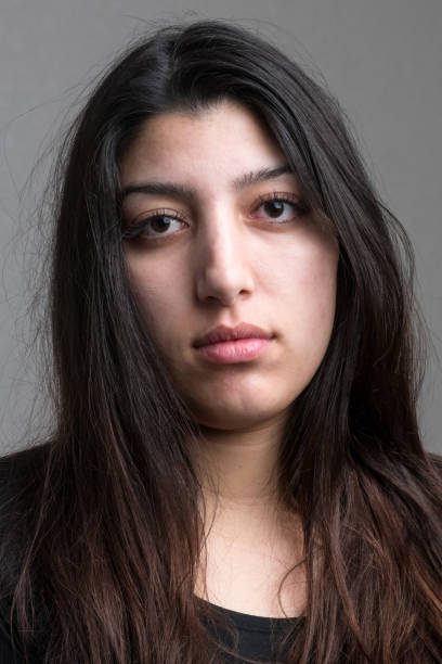 istock Serious young woman face 1020768918