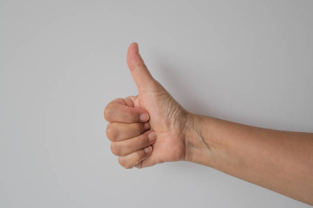istock Female hand with thumbs up 1020774222